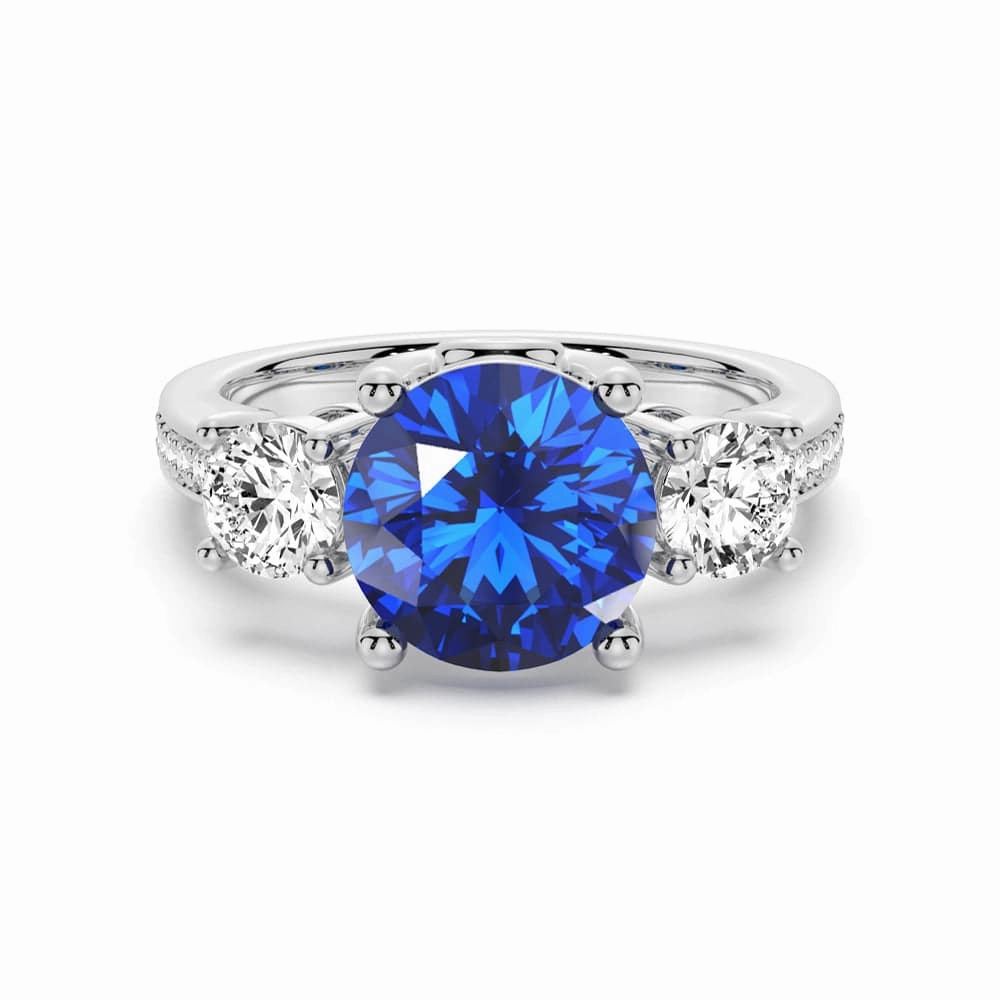 Contemporary Glow Precious Glow 2.5 CT. Classic Blue Sapphire and White Sapphire Three Stone Ring