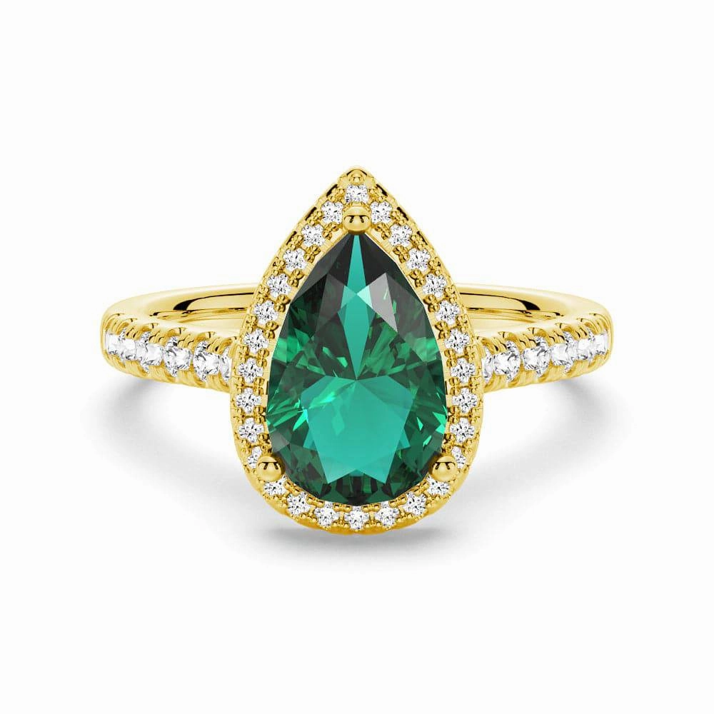 Opulent Design Everyday Essential 1.5 CT. Pear Shaped Emerald Ring with White Sapphire Halo Accents