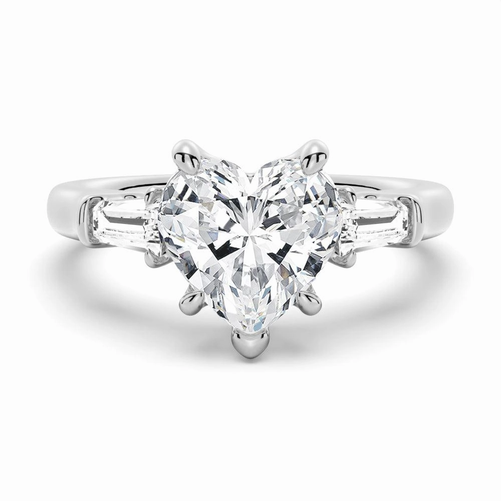 Heart Shaped Moissanite Engagement Ring with Tapered Baguette Side Stones Candid Shot Glow Accent