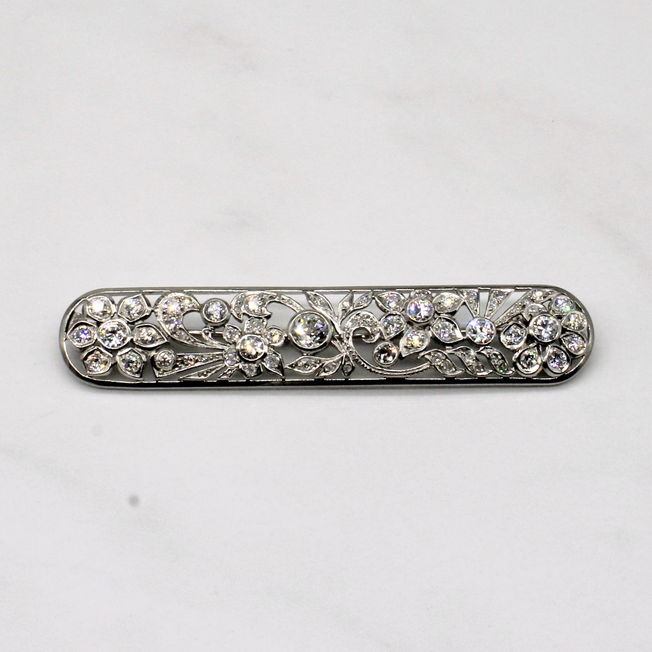 Timeless Sparkle Everyday Accessory Vintage Pierced Platinum Flower and Leaf Old European Diamond Brooch | 0.39ctw, 1.88ctw, 0.44ctw |