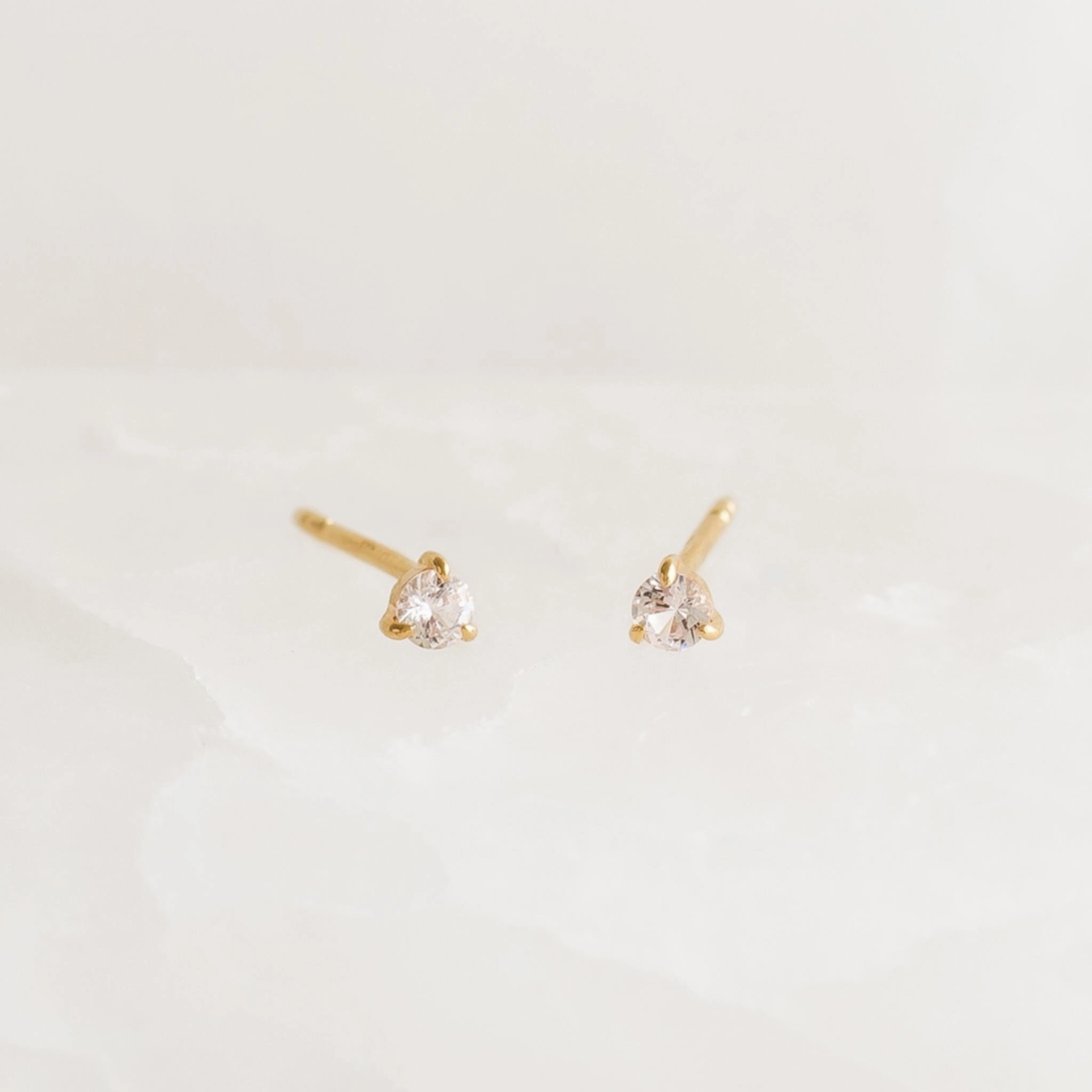Luxury Charm April Birthstone Stud Earrings 14k Gold - White Sapphire