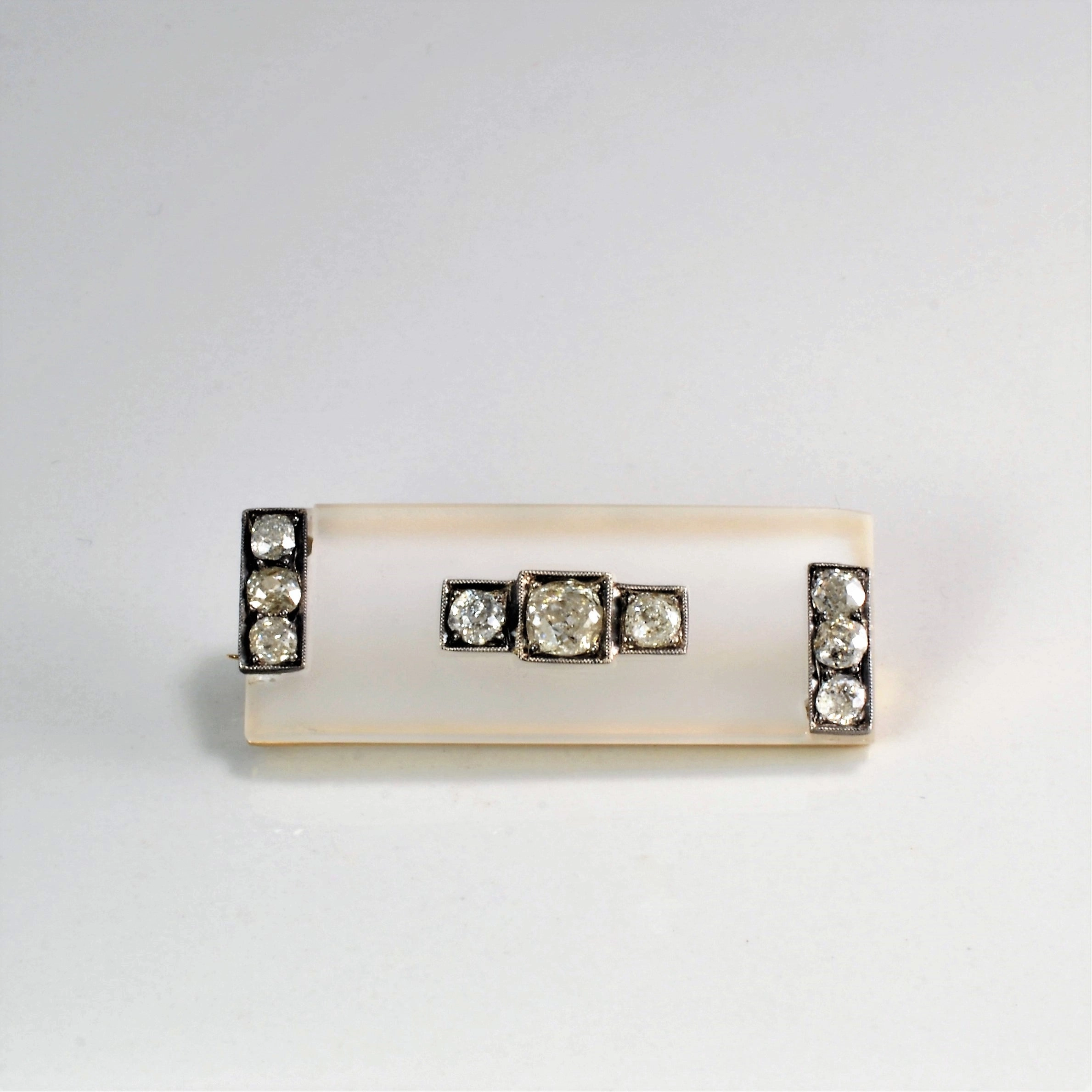 Distinctive Jewelry Pieces Art Deco Diamond & Camphor Glass Brooch | 0.86 ctw |