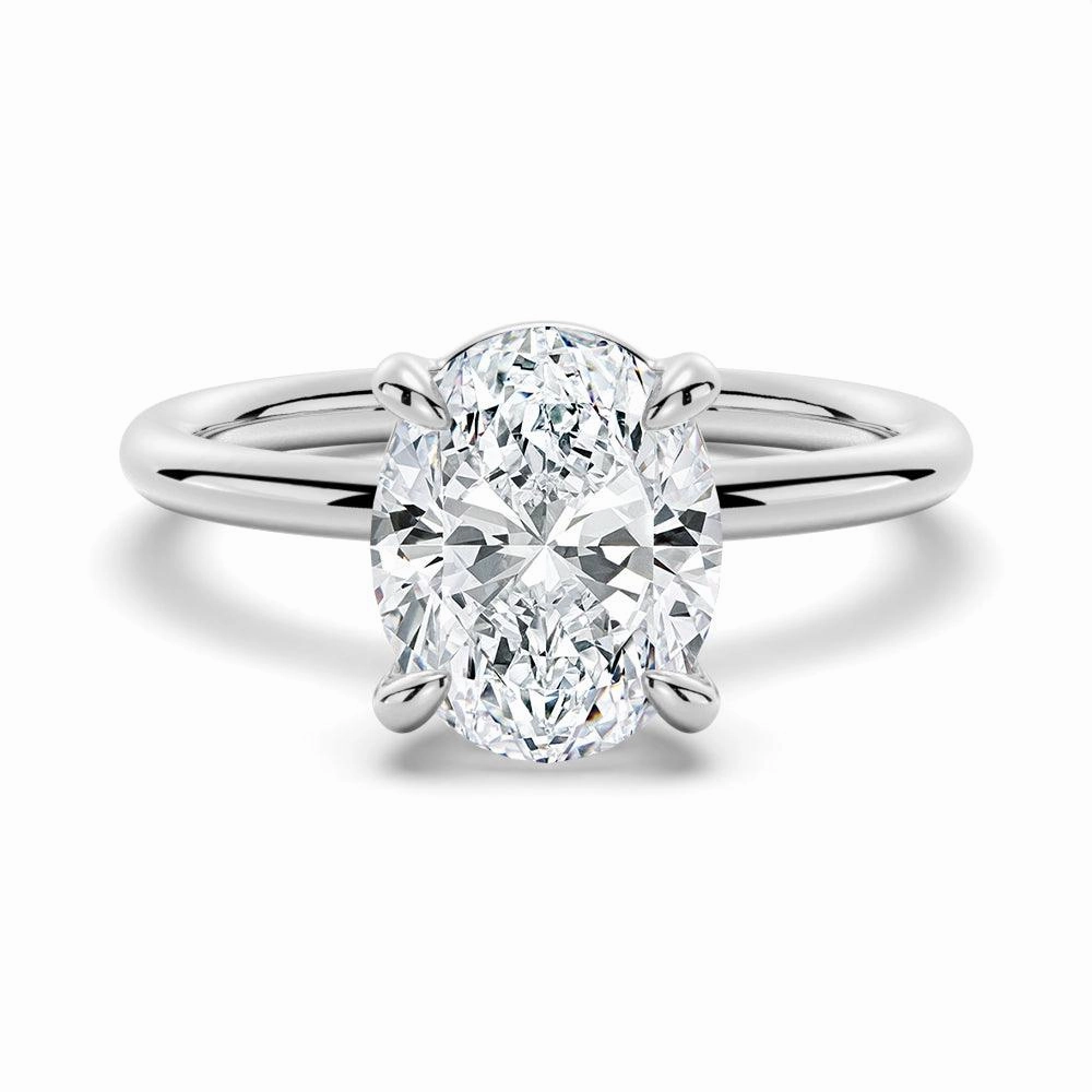 Four Prongs Oval Solitaire Moissanite Engagement Ring Subtle Glow Alluring Accent