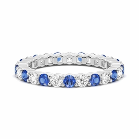 Gleaming Glow Gift Season Prong Set Blue Sapphire and White Sapphire Eternity Wedding Band