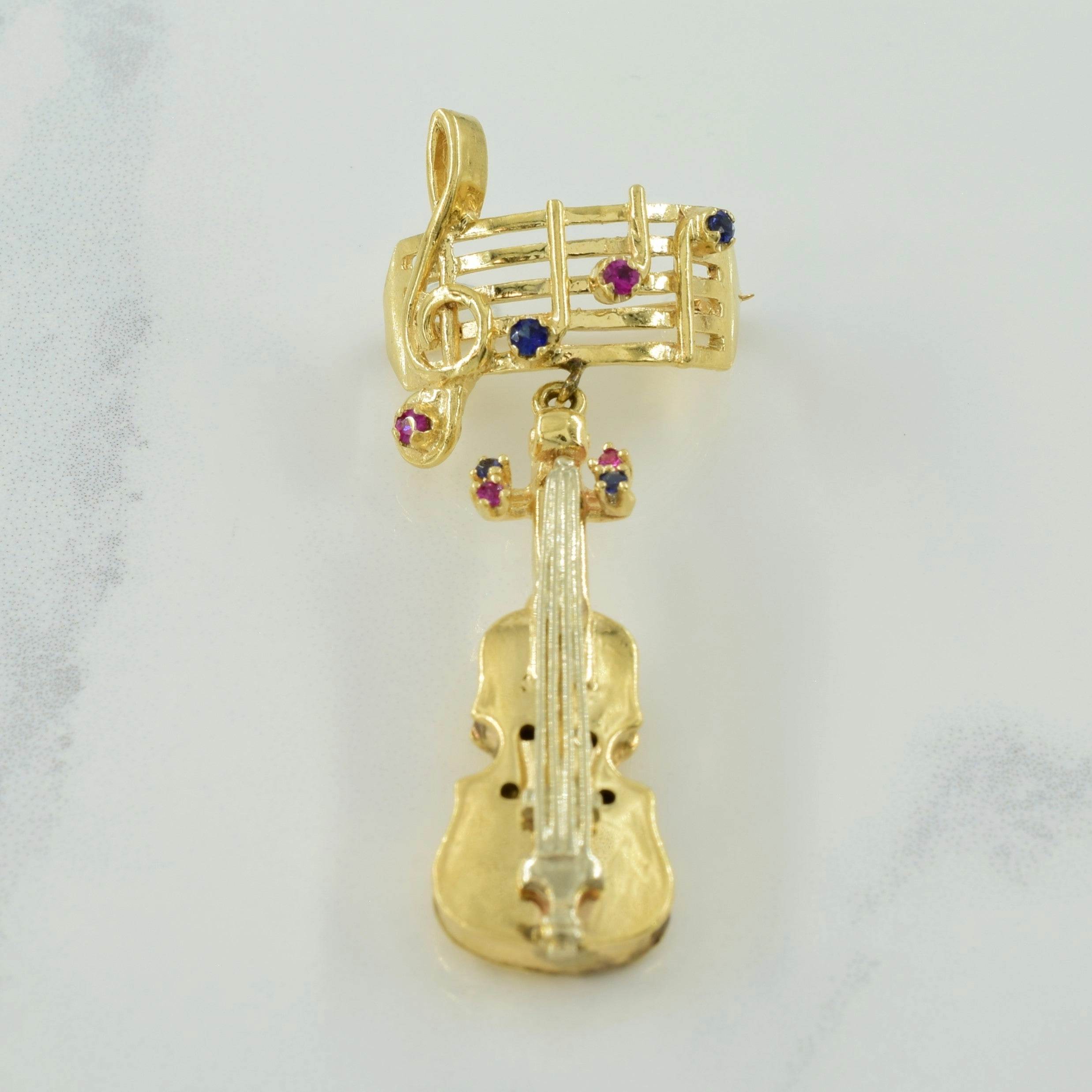 Synthetic Ruby & Sapphire Musical Staff & Violin Brooch | 0.30ctw | Bold Fashion Bold Contour