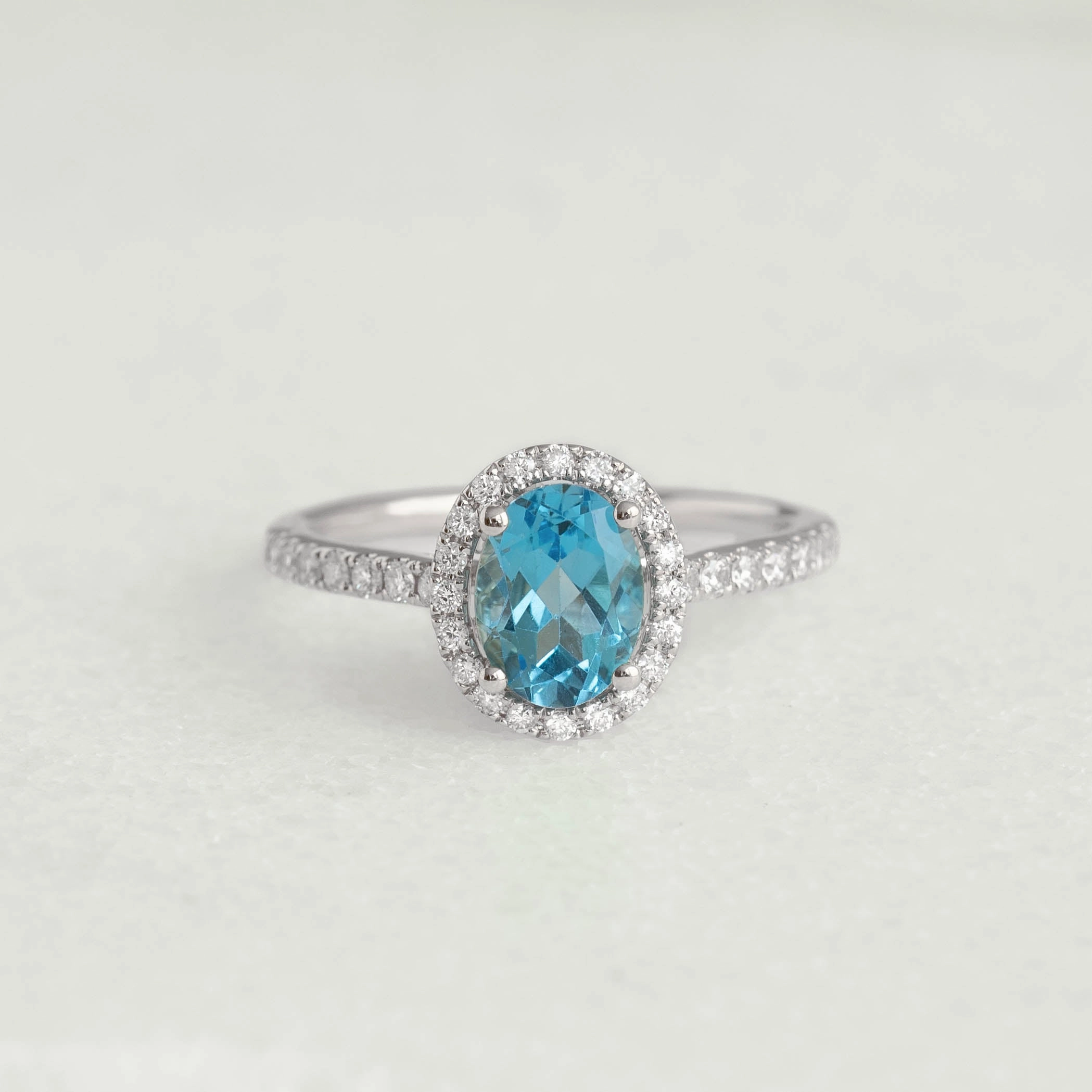 Evening Style Oval Swiss Blue Topaz Halo Ring White Gold - Suna
