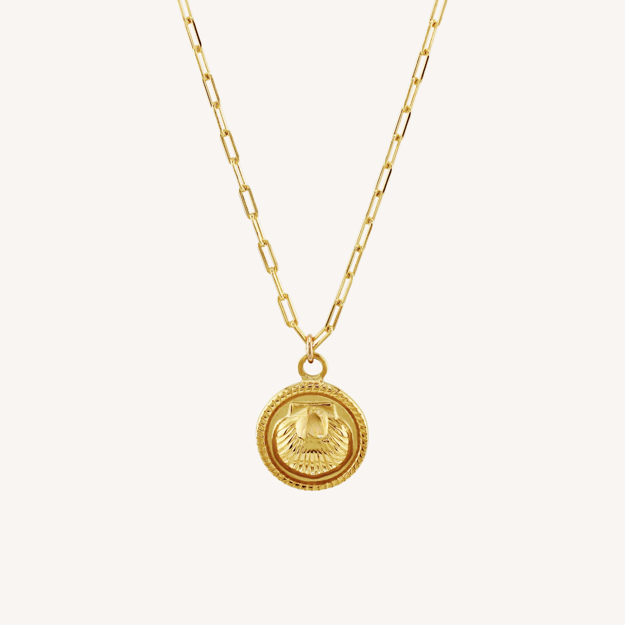 THE COVE SHELL MEDALLION COIN NECKLACE Bold Detailing Timeless Finish