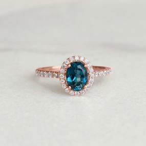 Oval London Blue Topaz Halo Ring Rose Gold - Suna Effortless Accent