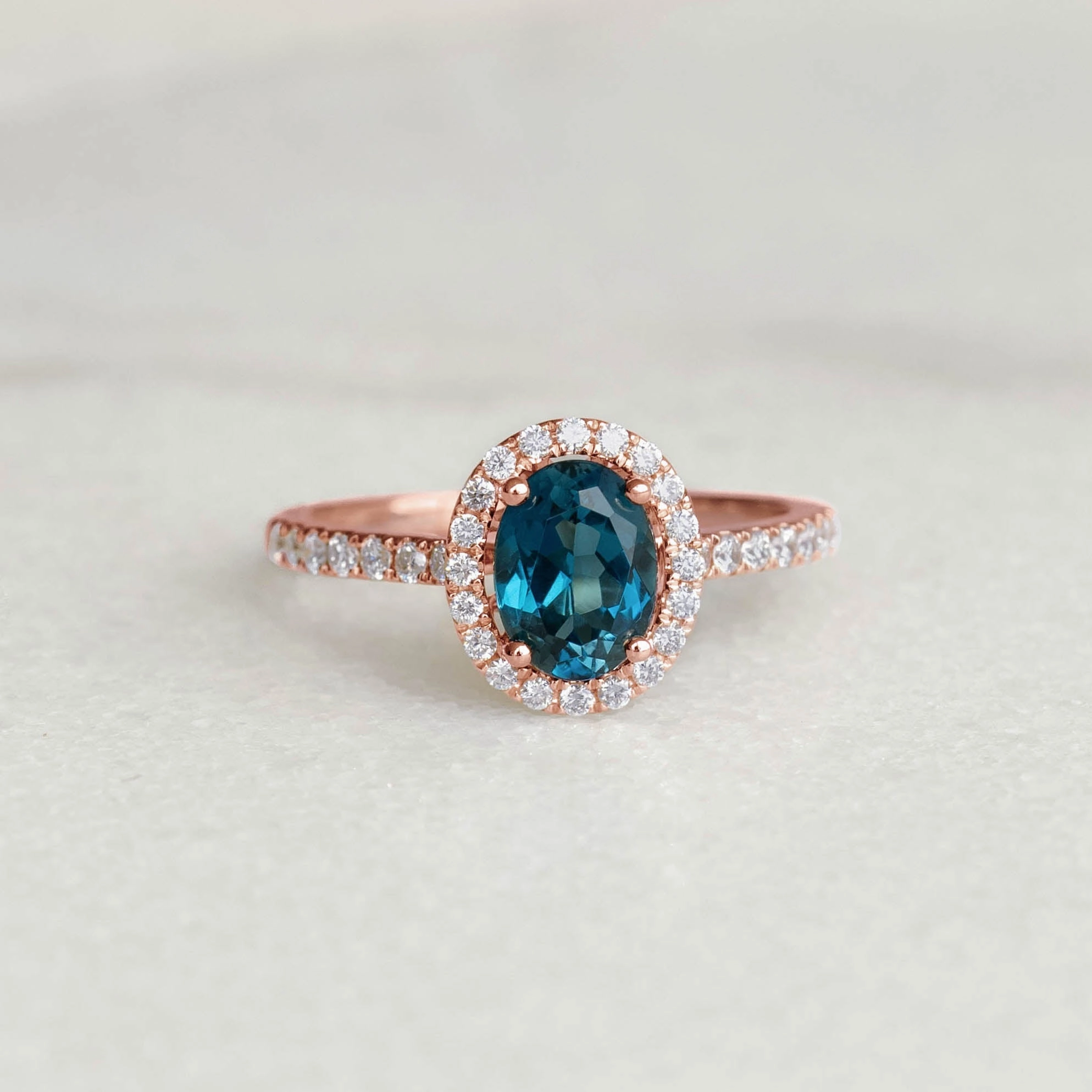 Gleaming Feature High Polish Oval London Blue Topaz Halo Ring Rose Gold - Suna