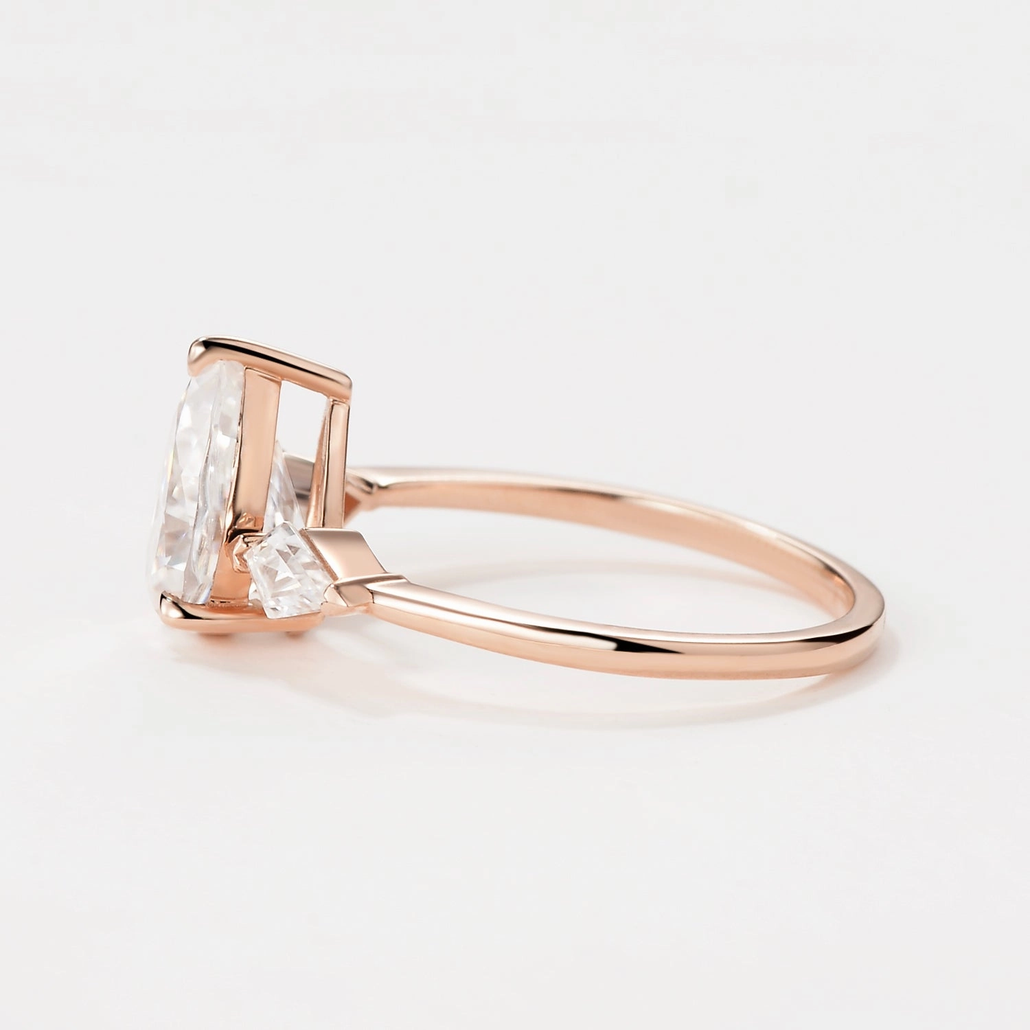 Pear Cut Three-stone Moissanite Engagement Ring Shiny Jewelry Touch Flat Lay