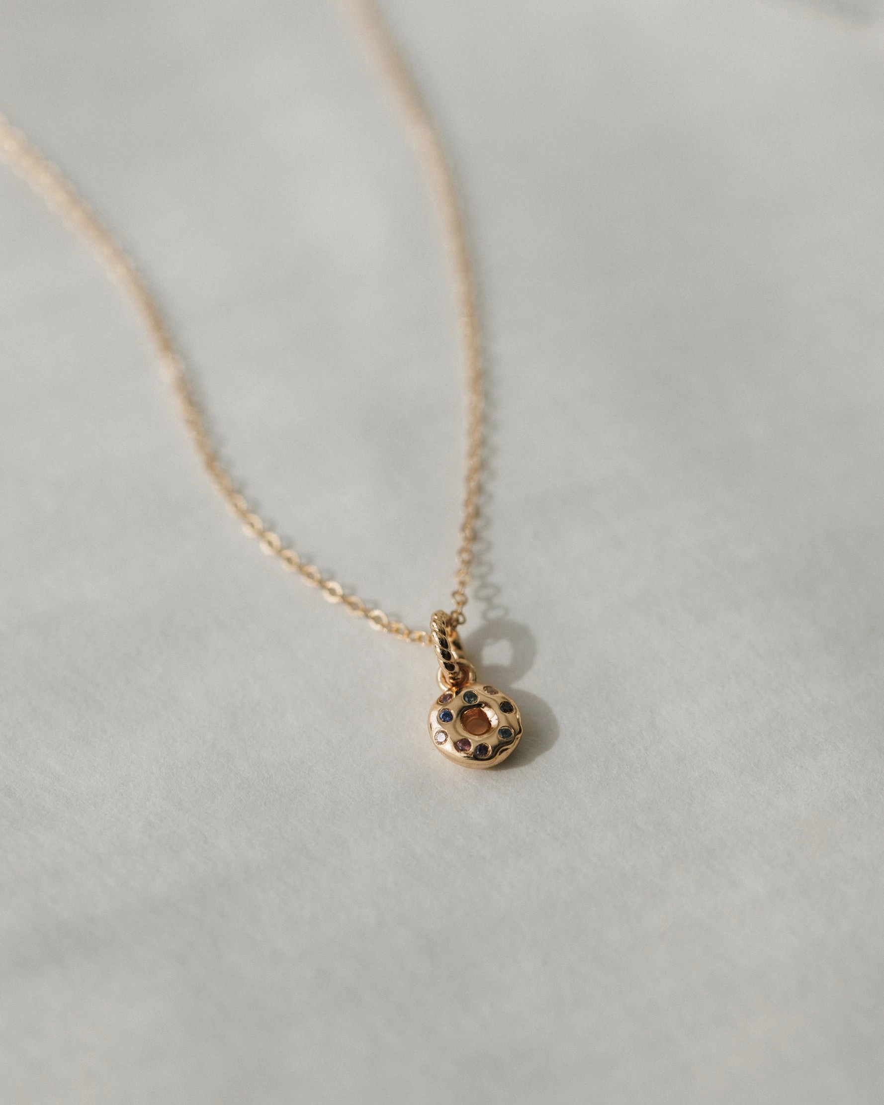 Radiant Detail Glow Look Sprinkled Donut Charm