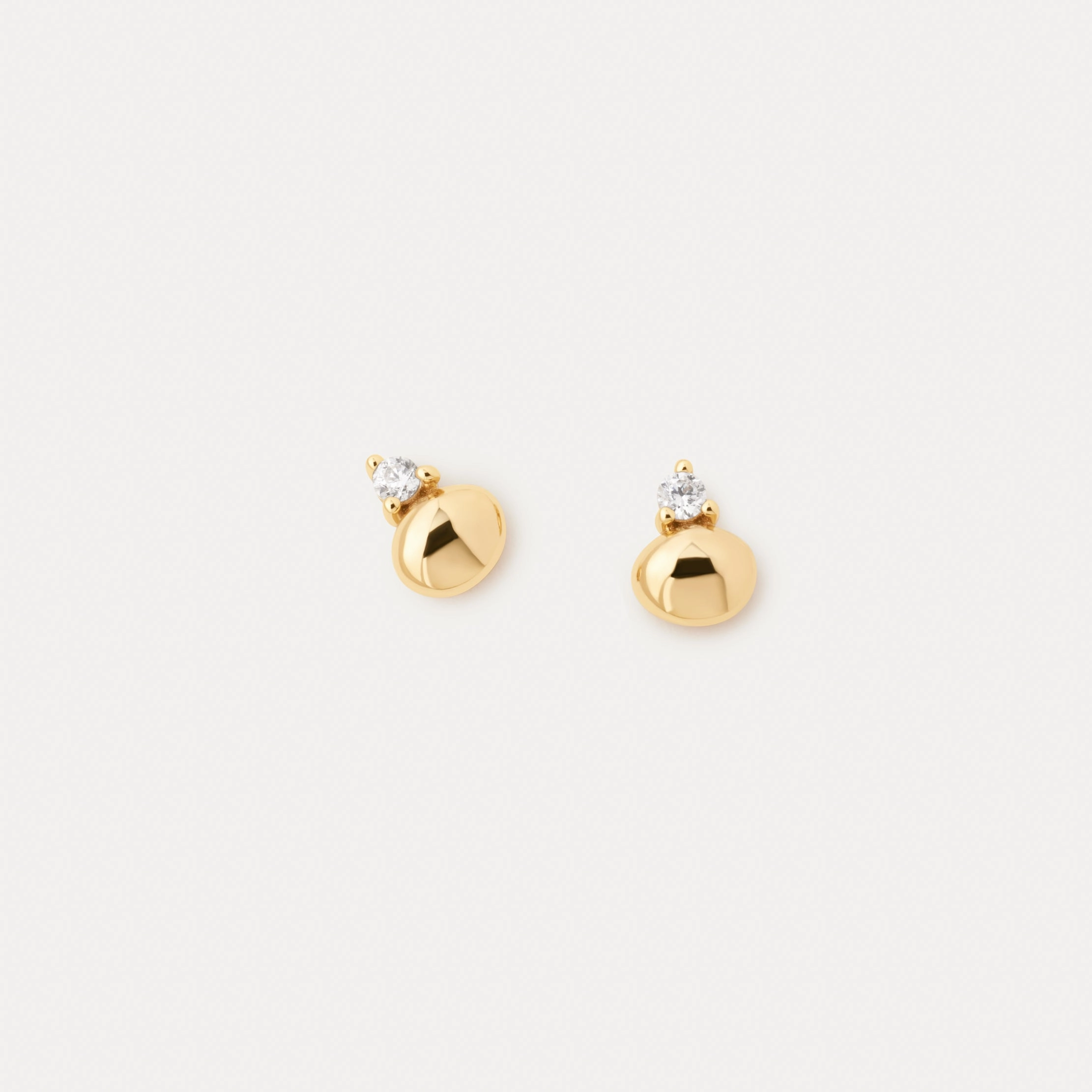 Gleaming Pebble Studs Elegant Statement Delicate Highlight