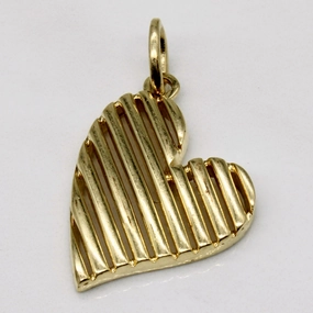 Dynamic Feature 14k Yellow Gold Heart Charm