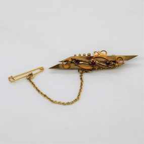 Evening Feature Early 1900s Ruby Cloak Pin | 0.20ctw |