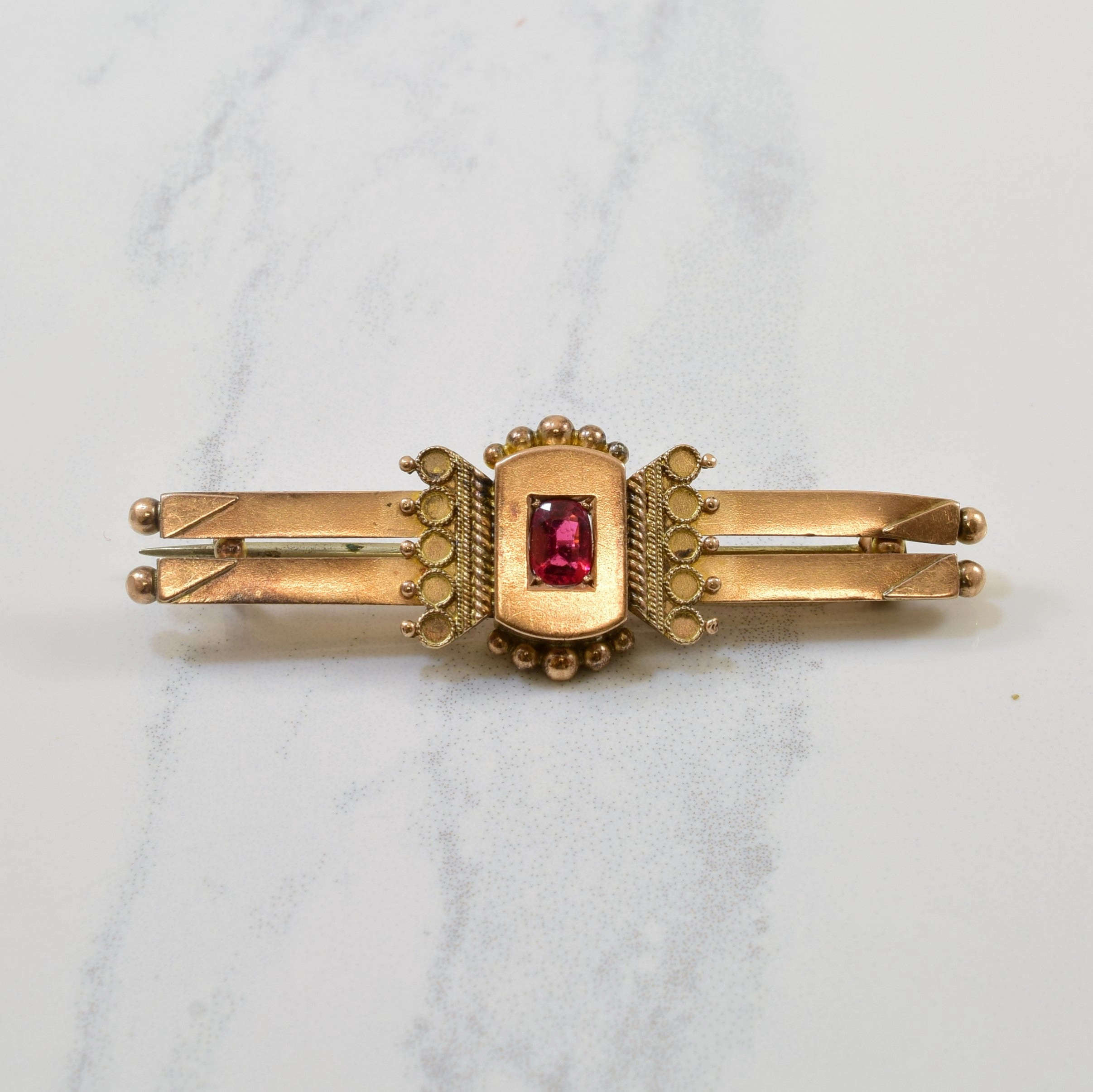 Polished Detail Victorian Oval Cut Garnet Brooch | 0.30ct |