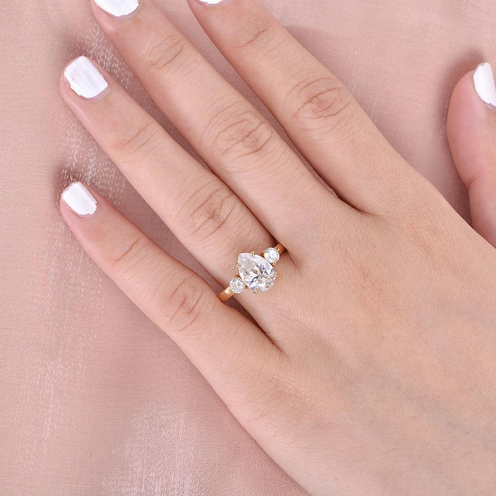 Pear Shaped Moissanite Three Stone Ring Bold Glow